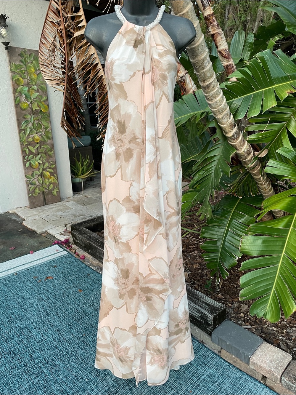 beaded collar, soft floral gretchen style gown by Calvin Klein